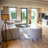 Sfeerfoto Scandinavische hoekbank Memphis taupe stof gemêleerd links