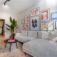 Sfeerfoto Scandinavische hoekbank Denver bouclé beige rechts